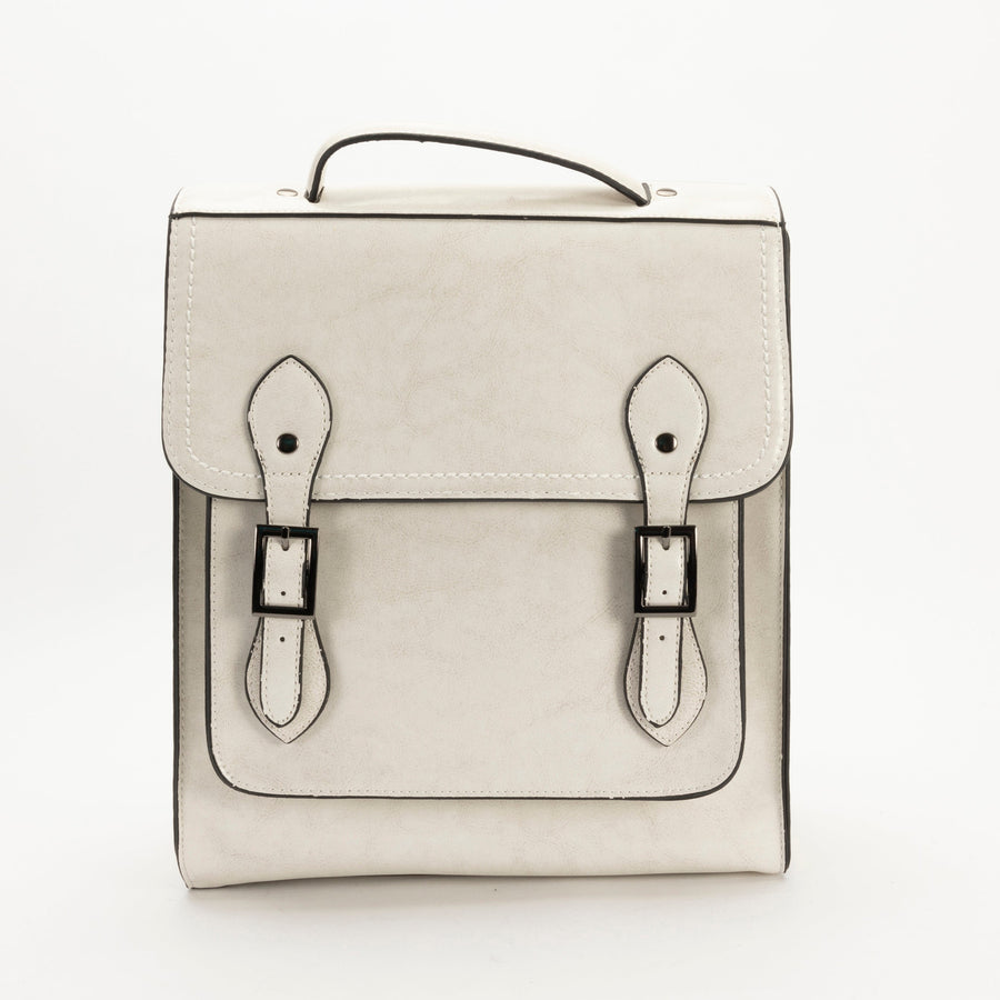 A brown leather backpack with a structured silhouette, featuring a front flap with two buckles, a top handle and shoulder straps.