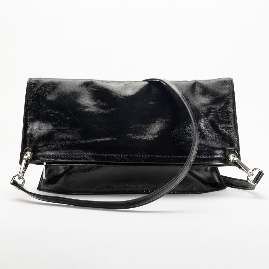 Black leather clutch bag with a strap on a white background